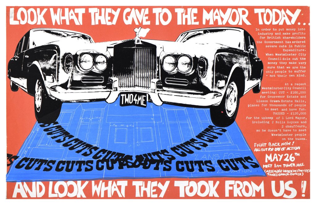 Light brown ground with enjoined mirrored Rolls Royce cars whose tyres cross a building blueprint with white lettering Look What They Gave to the Mayor Today and Look What They Took from Us
